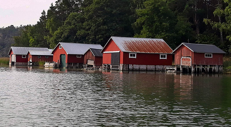 row of boathouses